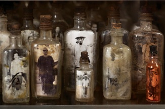 Navin Rawanchaikul There is No Voice (3), 1994-2012 (detail) Wood, glass bottles, photgraphs 200 x 65 x 150 cm Image courtesy: The Gene and Brian Sherman Collection, and Sherman Contemporary Art Foundation, Sydney Photo: Yavuz Gallery
